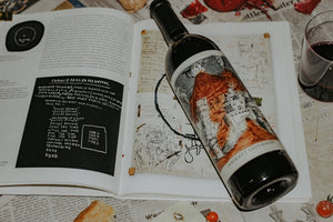 Cabernet Sauvignon on top of a design book